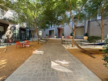 Beautiful Courtyard With Walking Paths at Civic at Frisco Square Apartments, Texas, 75034